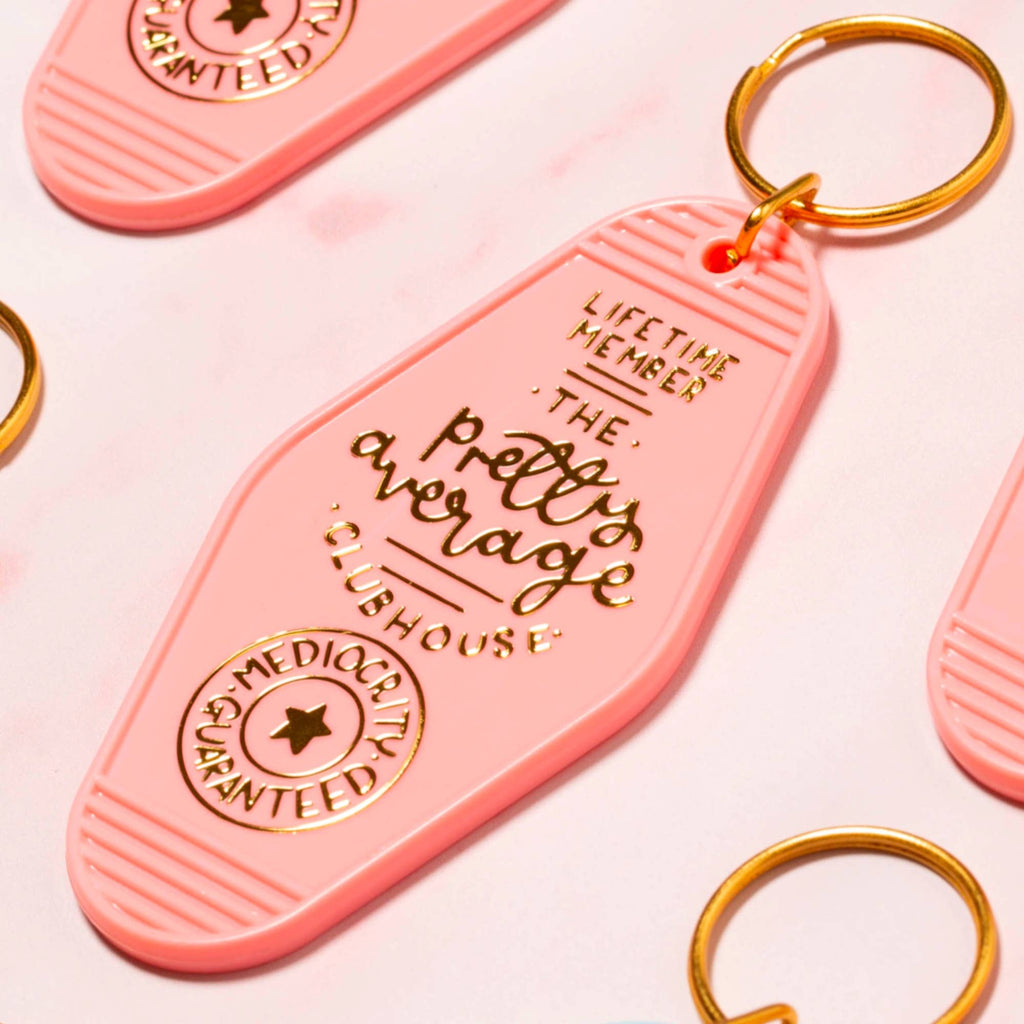 Laura Oh - the pretty average clubhouse keyring