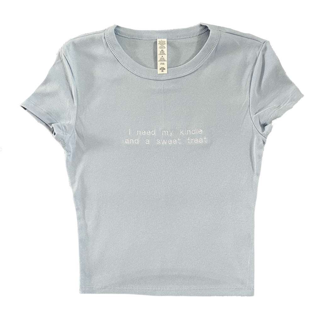 “I need my kindle and a sweet treat” - Embroidered T-Shirt