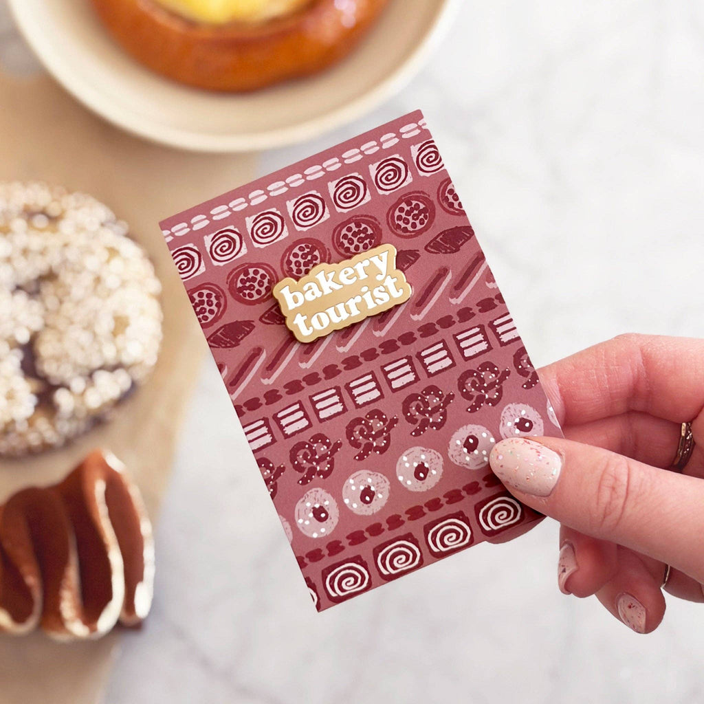 Alphabet Bags - Bakery Tourist Enamel Pin