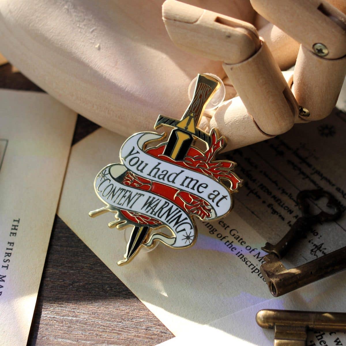 Content Warning bookish enamel pin