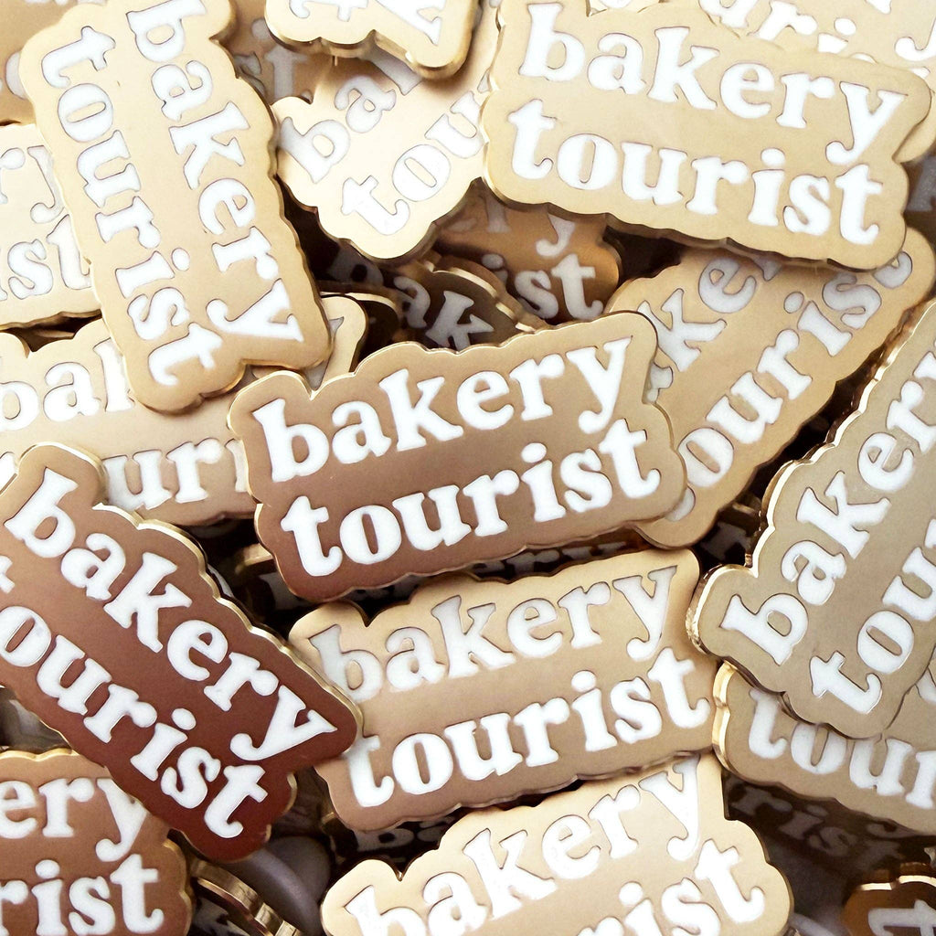 Alphabet Bags - Bakery Tourist Enamel Pin