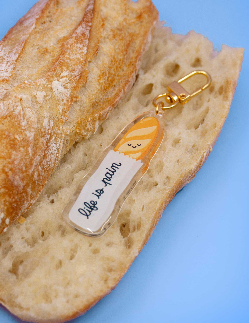 Joanna Behar - "Life is Pain" Baguette Keychain