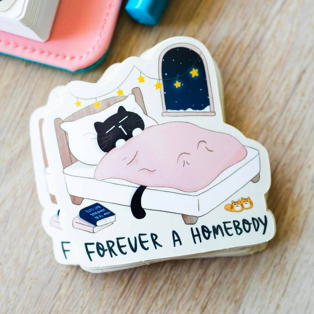 "Forever a homebody" cozy black cat sticker