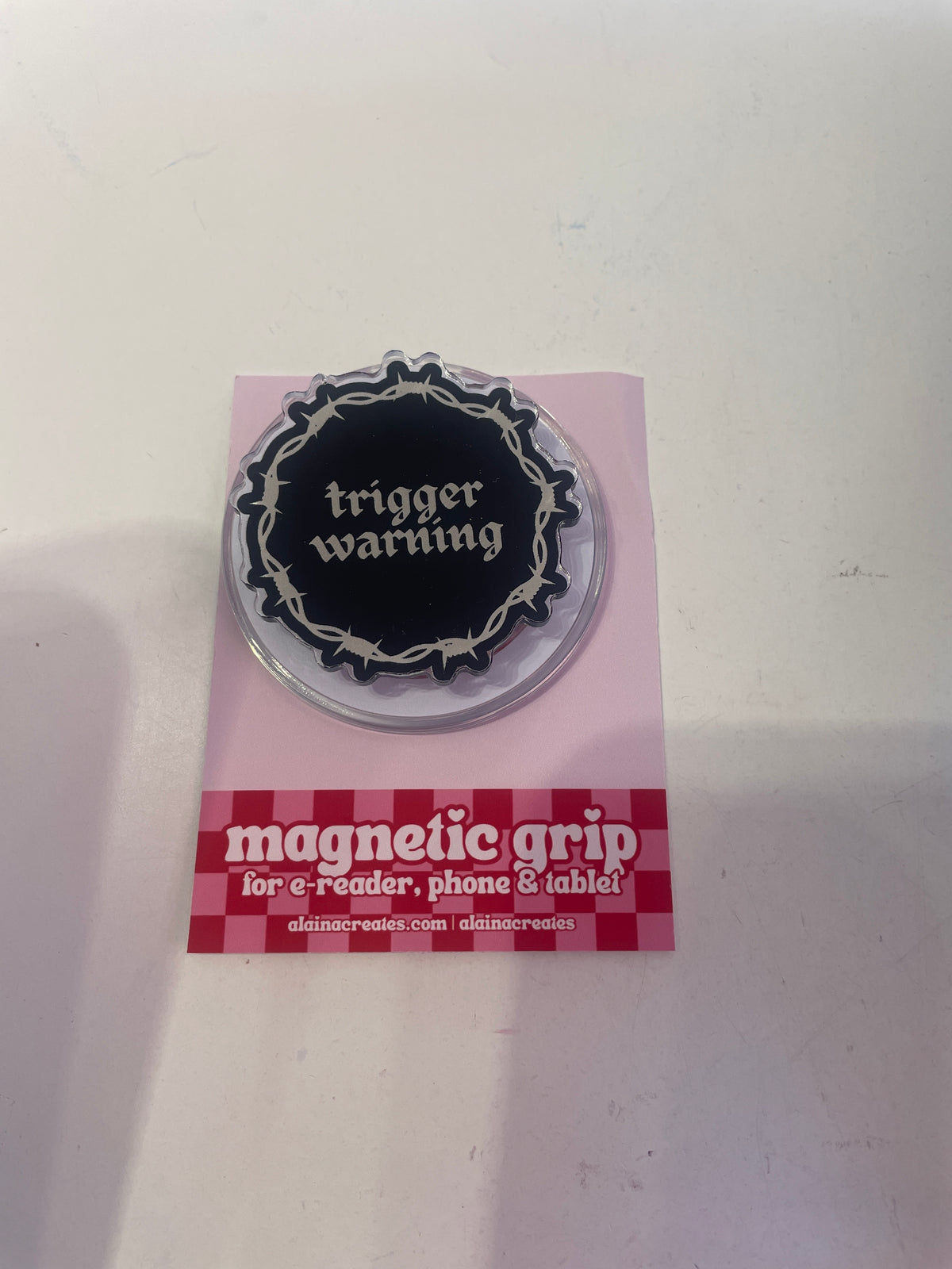 Alaina Creates - ‘Trigger warning’ Magnetic Kindle Grip
