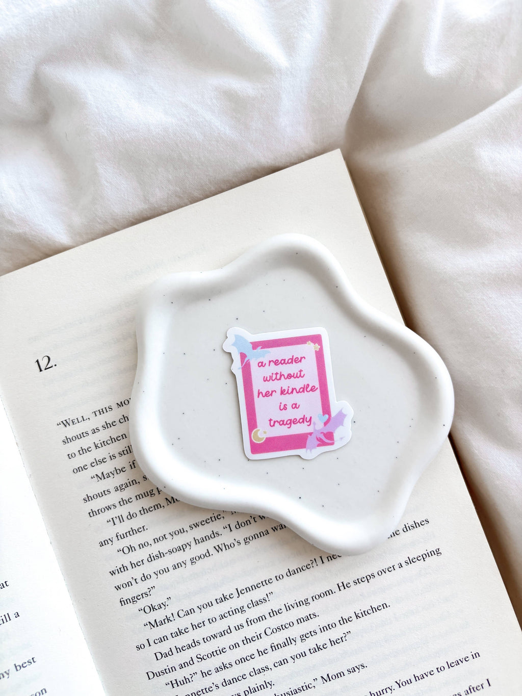 A Reader Without Her Kindle Is A Tragedy Sticker