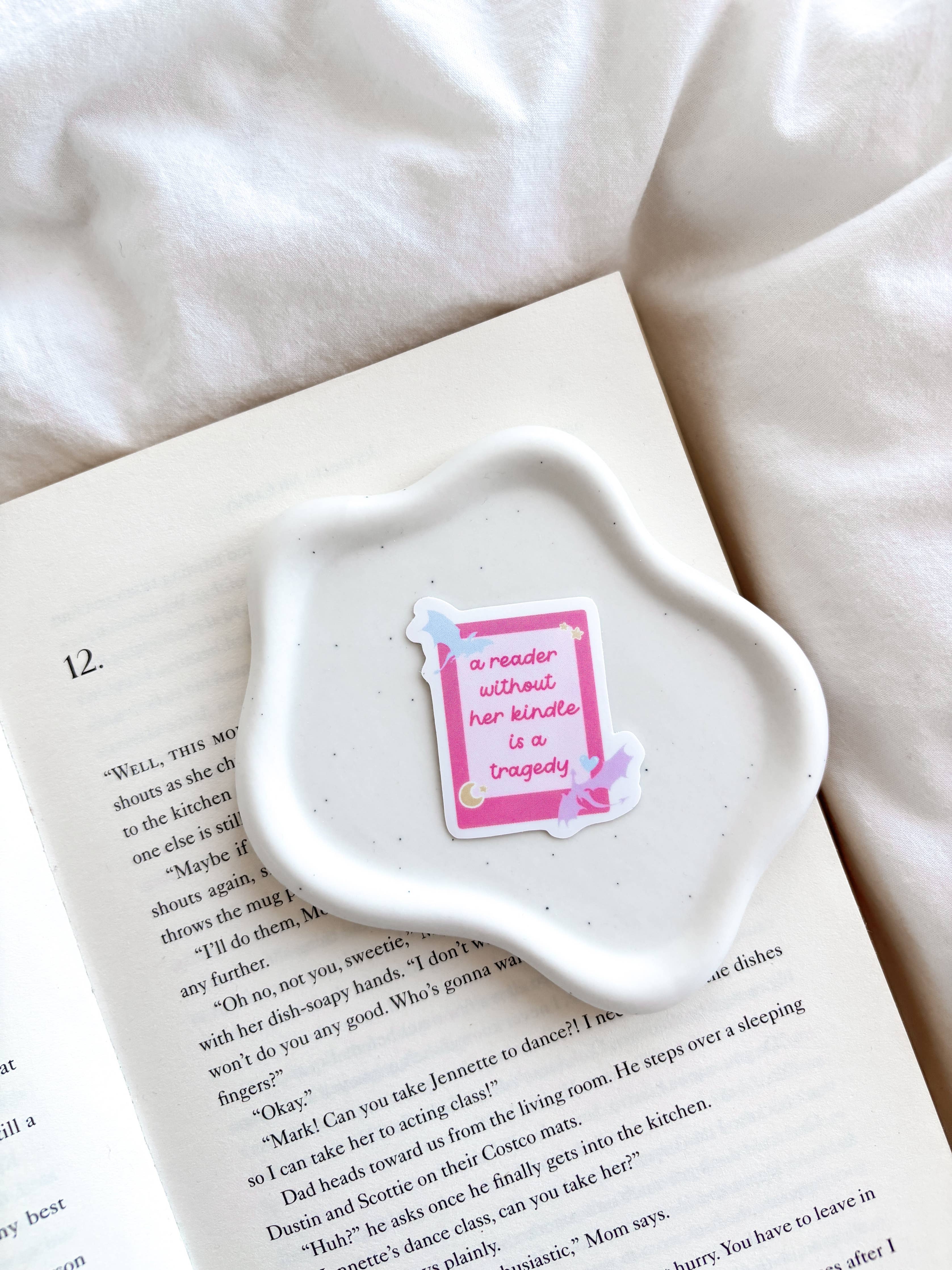 A Reader Without Her Kindle Is A Tragedy Sticker