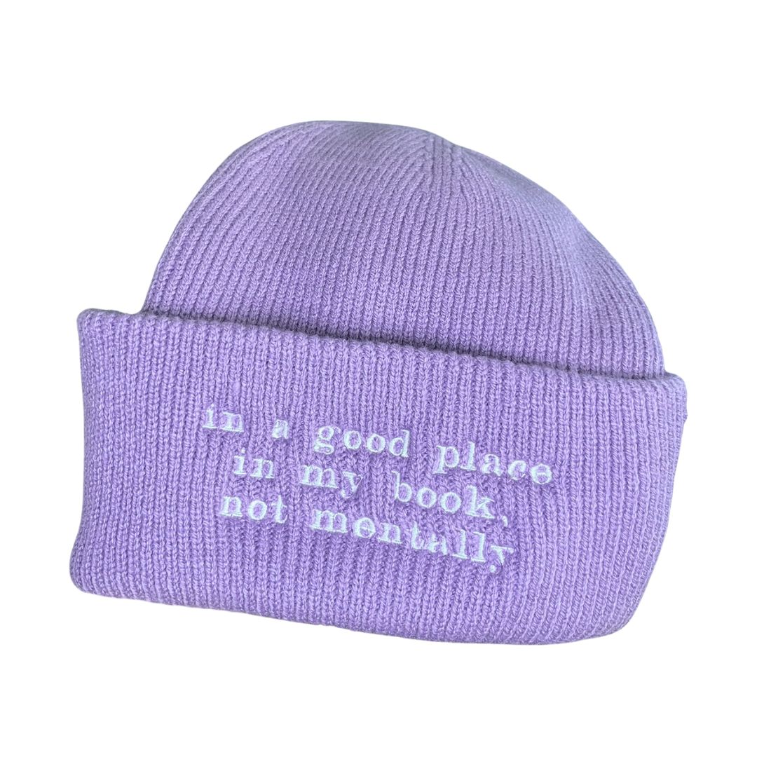 "in a good place in my book, not mentally" embroidered beanie