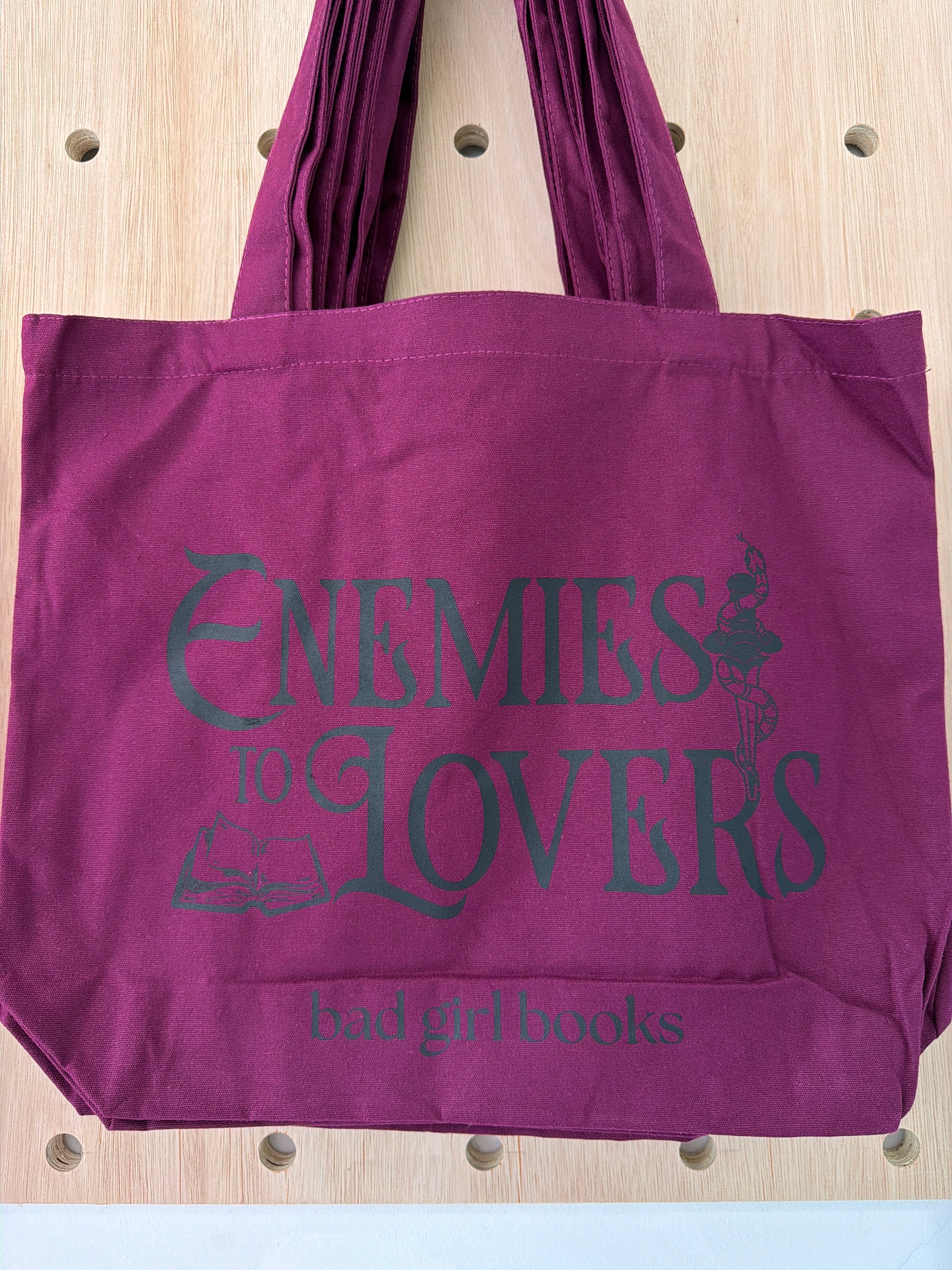 Enemies to lovers tote bag