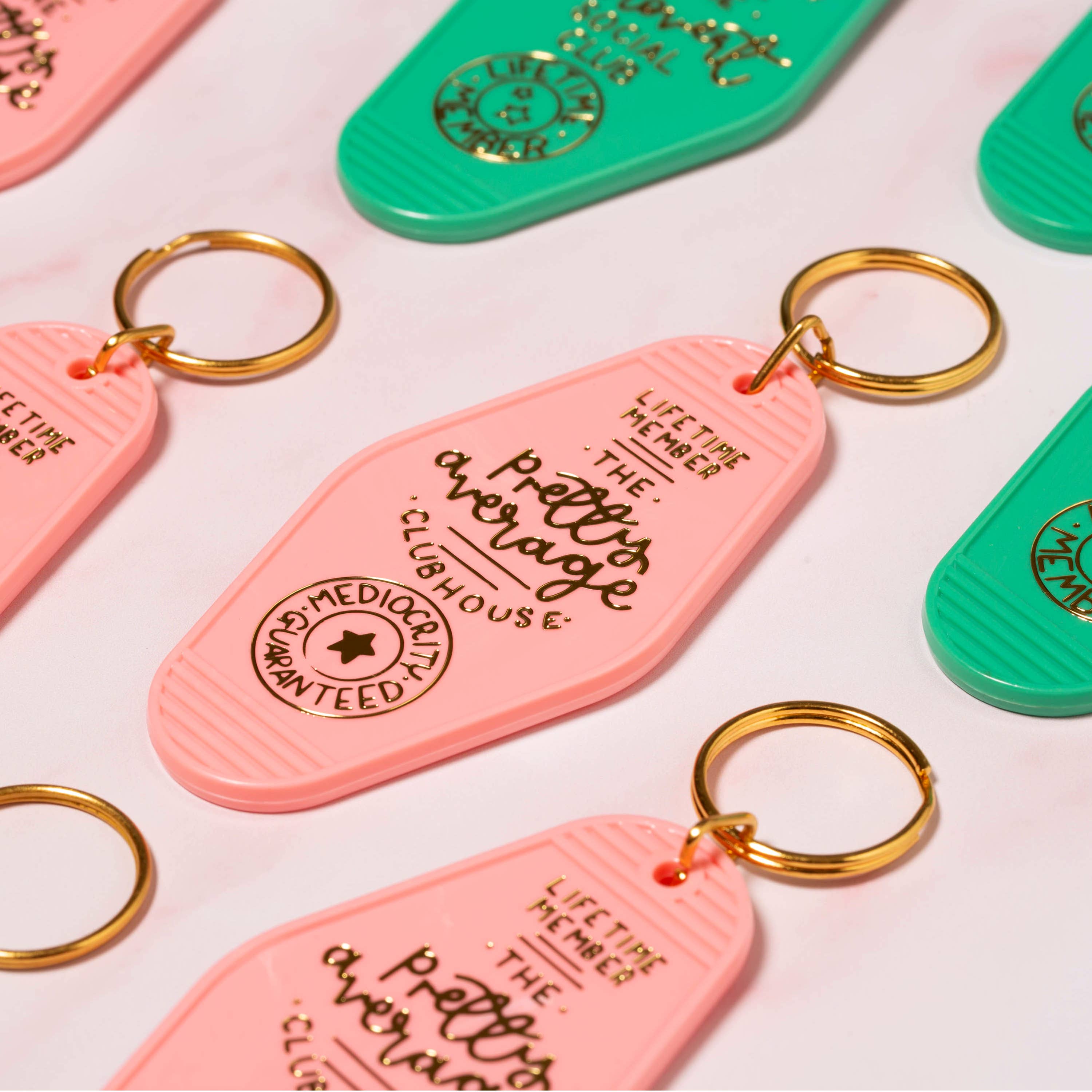 Laura Oh - the pretty average clubhouse keyring