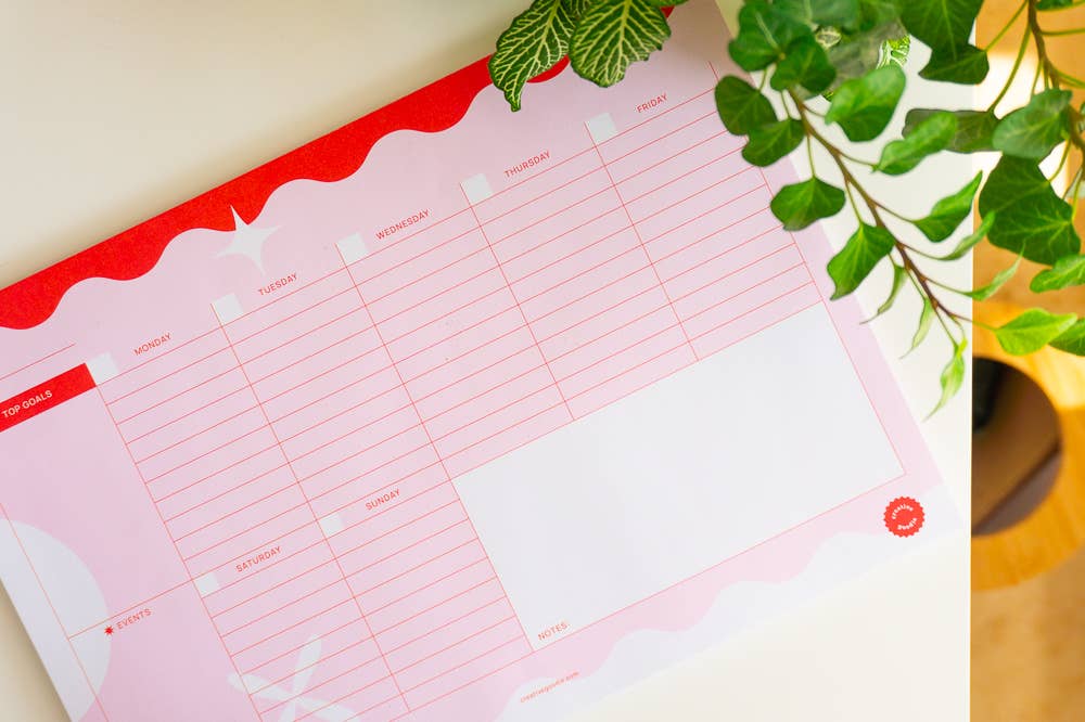 A4 Weekly planner pad with tasks, goals, events, and notes