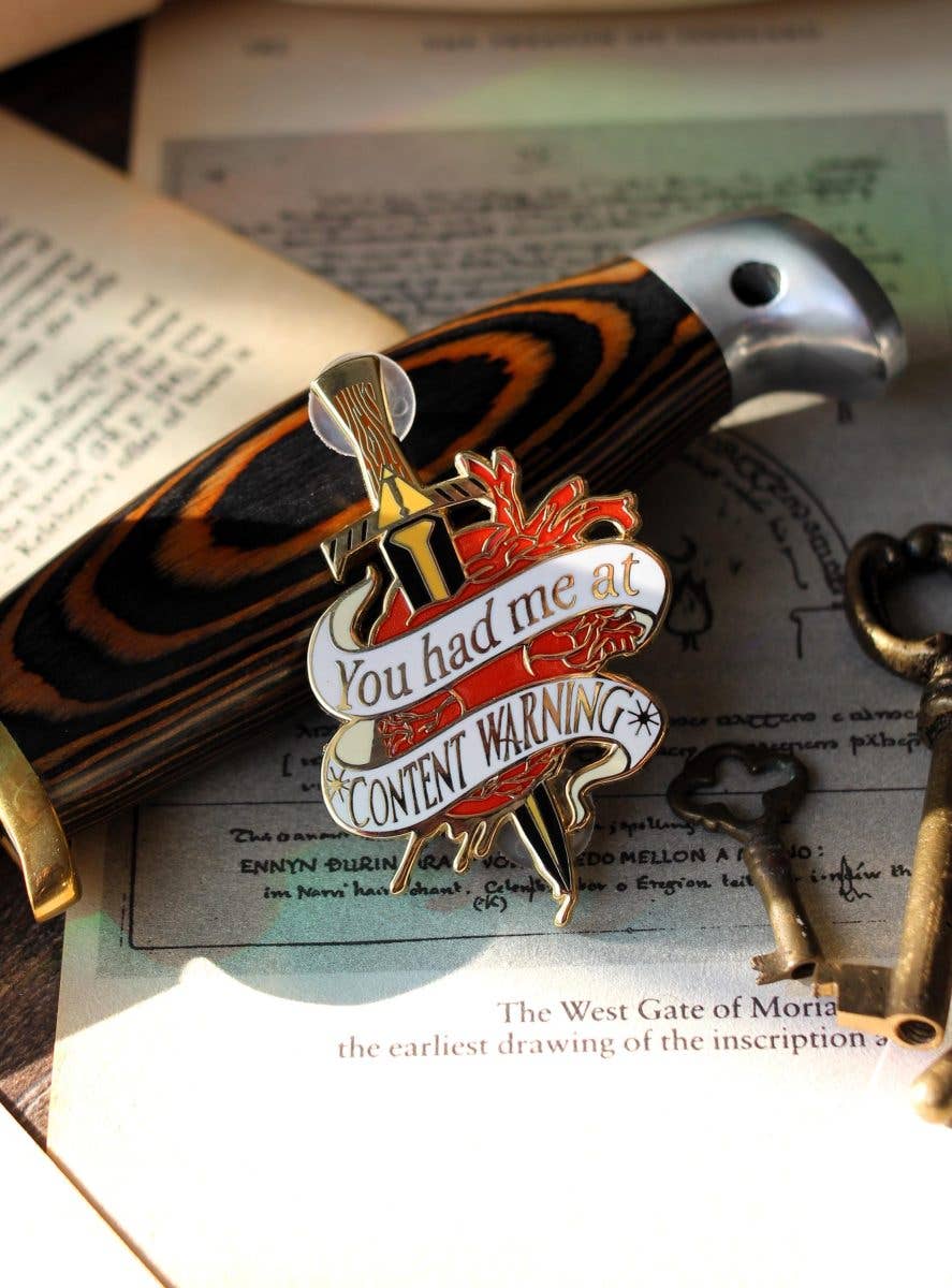 Content Warning bookish enamel pin