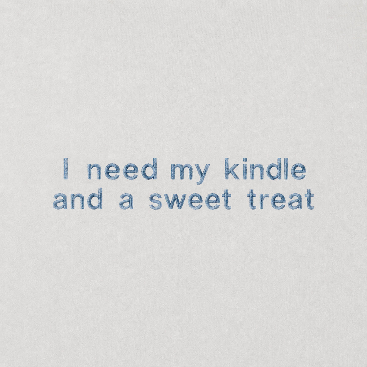 "I need my kindle and a sweet treat" embroidered T-shirt
